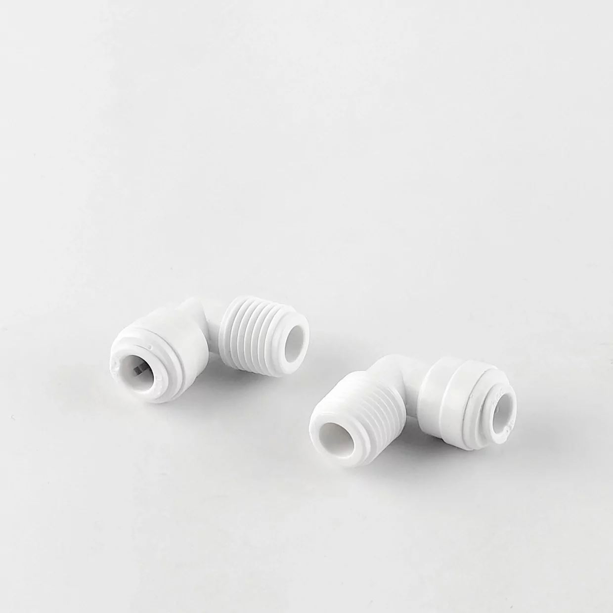 Фітинг кутовий Raifil 2817-H (4ME4-2-D Oring) 1/4"-1/4" (трубка-різьба зовнішня) з гумкою